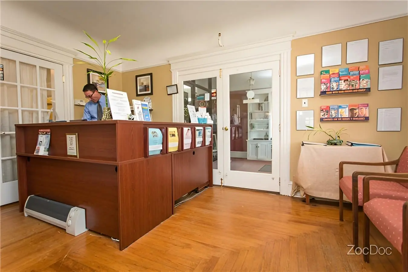 Chiropractic clinic reception desk for appointment booking in Freehold