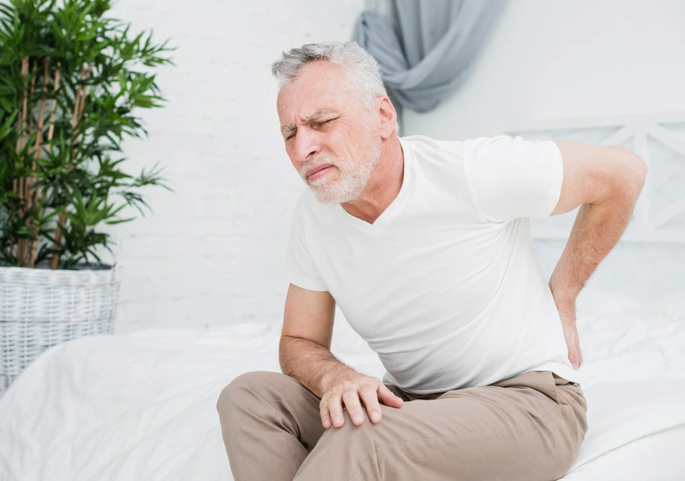 Chiropractor providing gentle care to senior patient