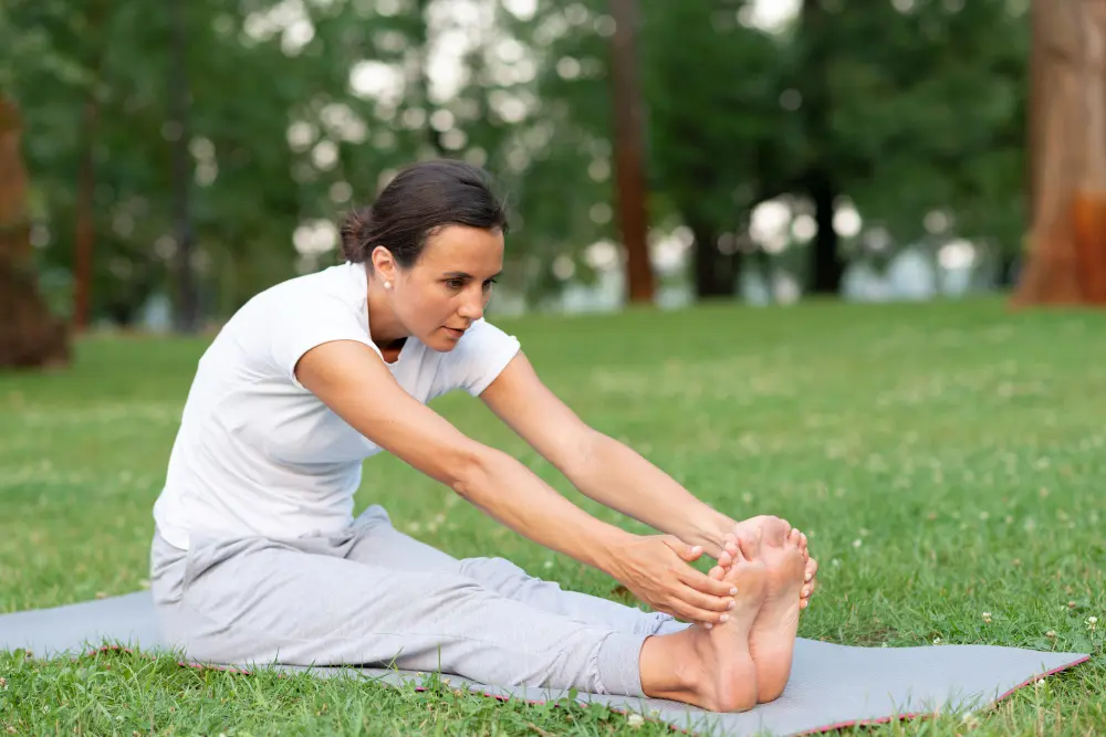 Woman stretching feet for plantar fasciitis relief exercise